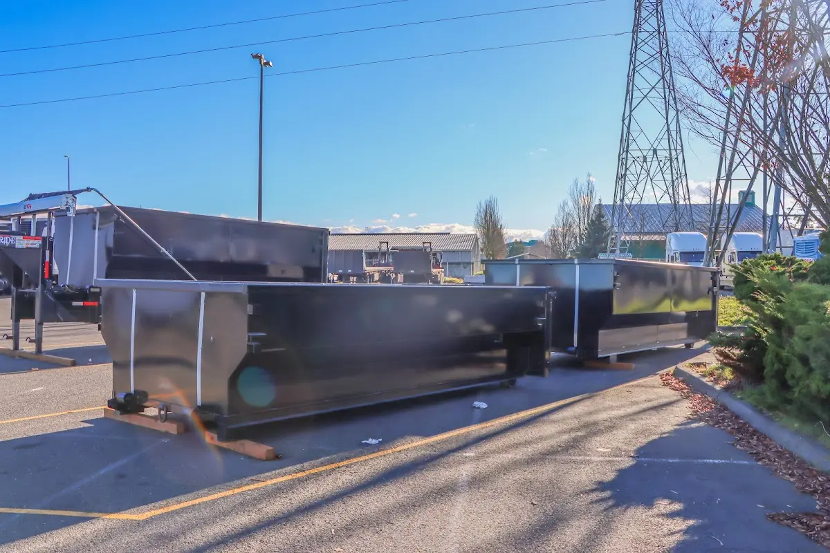 Roll-off dumpster ready for waste disposal at job site for 3 Yard Dumpster Rental in Laconia